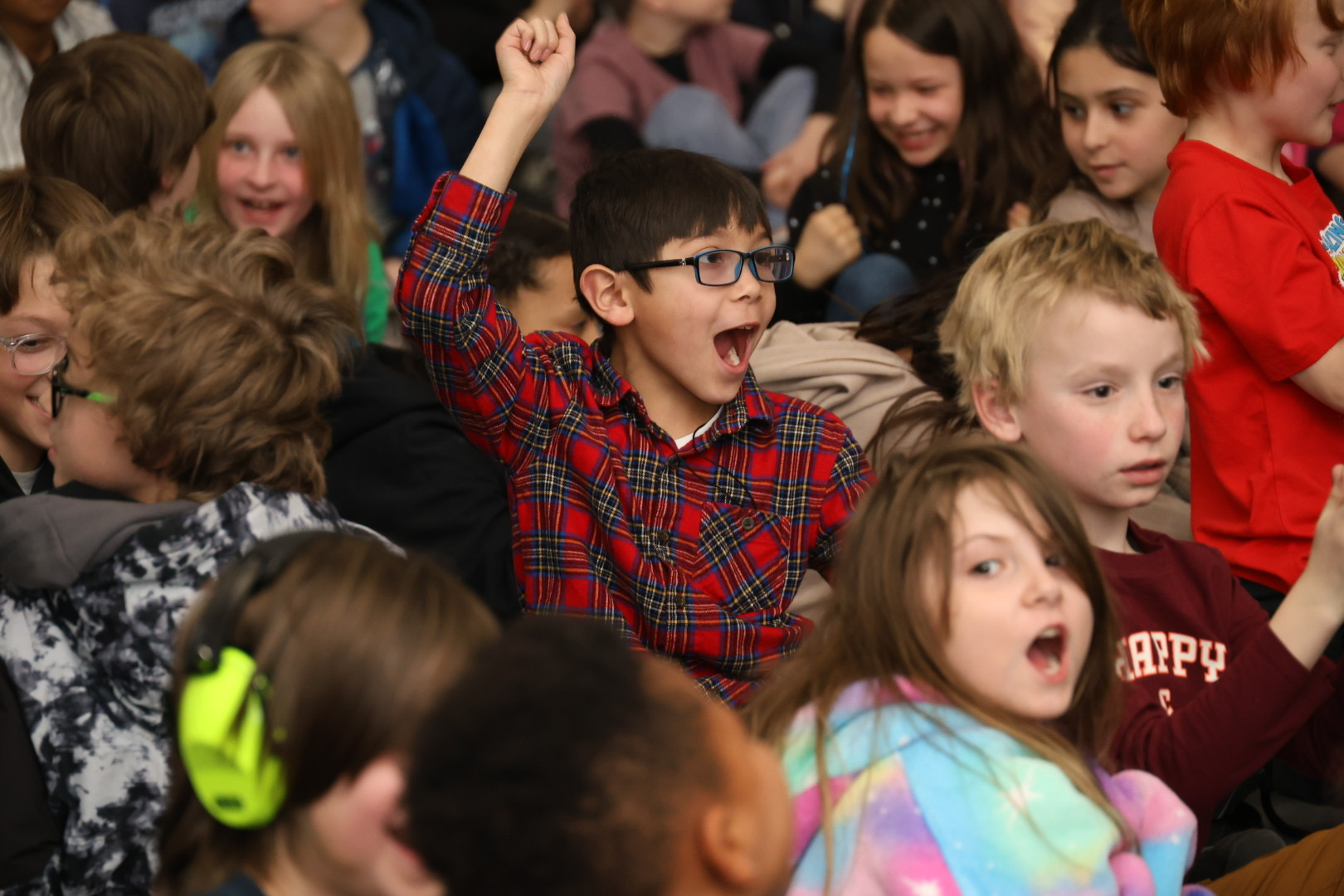 Excited students react to the ESEA Award at Remington Elementary in District 49. 