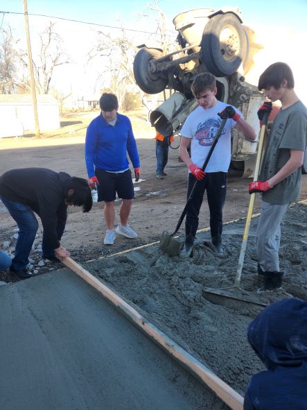 Students from the Plateau School District in Peetz, a small, rural school on the northeast plains, help remodel their classroom as part of their new construction program funded by the Northeast Colorado BOCES Rural Coaction grant.